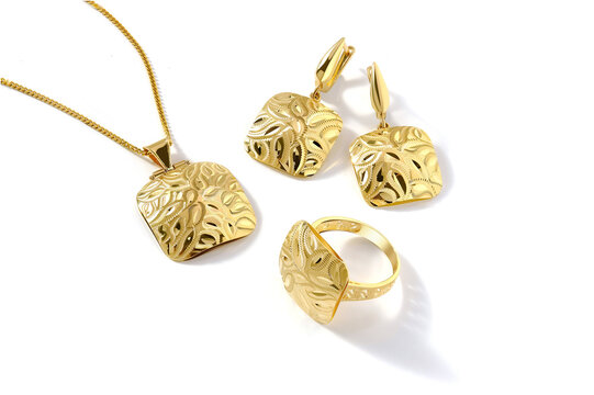 Elegant jewelry set. Jewellery set with gemstones. Product still life concept. Ring, necklace and earrings.