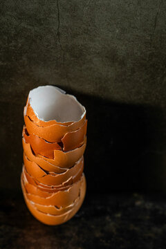 Stack of broken brown egg shells 