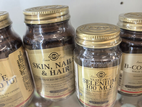 Natural wellness products displayed on a shelf inviting healthy choices