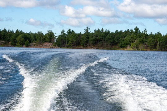 A boat ride from the cottage to the marina leaves a beautiful wake