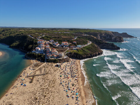 Odeceixe beach landscape in portugal where river meets ocean