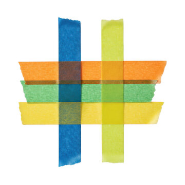 Colorful masking tape strips arranged in a simple grid pattern on a flat surface for creative art projects