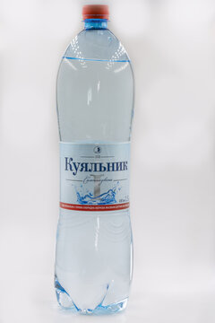 Kuyalnik Ukrainian mineral water plastic bottle closeup on white.