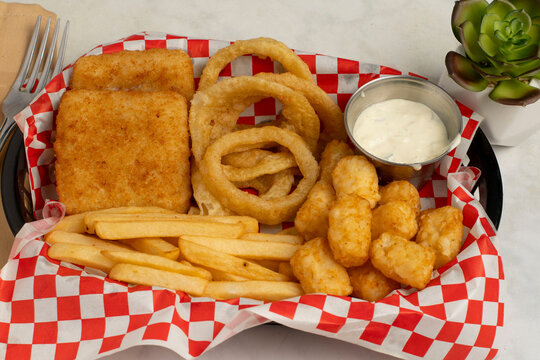 haddock fillets with onio rings and fries