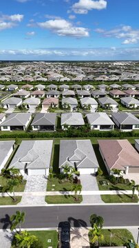 Hundreds of newly built, similar homes in Port St Lucie in St Lucie County, Florida. 