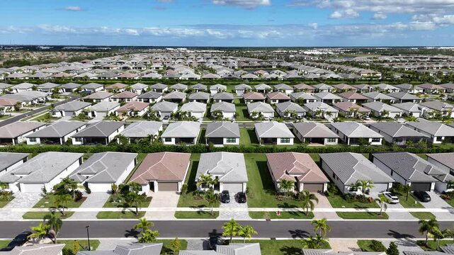 Rows and rows of brand new uniform homes in Port St Lucie in St Lucie County, Florida. 