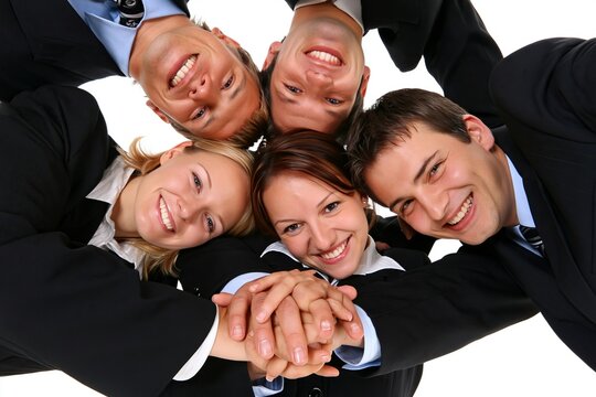 Low angle shot of cheerful business team stacking hands together in unity and strong partnership
