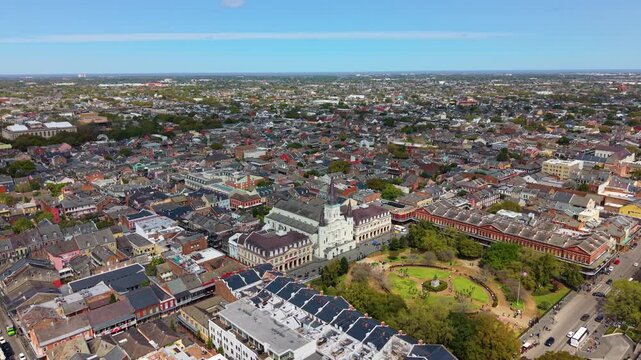 New Orleans skyline with Jackson Square, St Louis Cathedral and Bourbon Street. Waterfront district near Mississippi River. Aerial view of city historical architecture and cultural center.