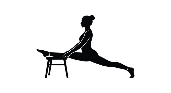 Silhouette of a woman performing a straddle split with chair support