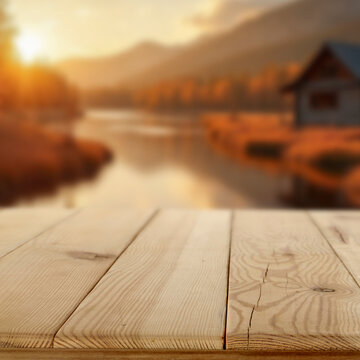 Autumn landscape with wooden table and copy space &ndash; warm seasonal concept
