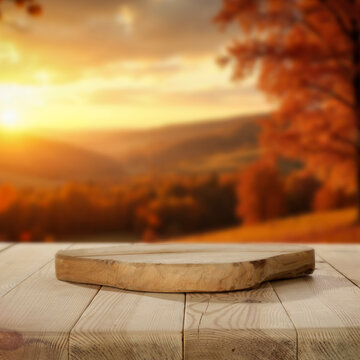 Autumn landscape with wooden table and copy space &ndash; warm seasonal concept