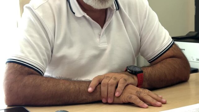  Hand gestures during business conversation at desk &mdash; close-up, white polo, Hand gestures during business conversation at desk &mdash; close-up, white polo