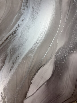 Handmade original alcohol ink abstract macro. Silver metallic fluid texture, swirling patterns, shimmer particles, glossy bubbles. Royalty free artwork, no AI.