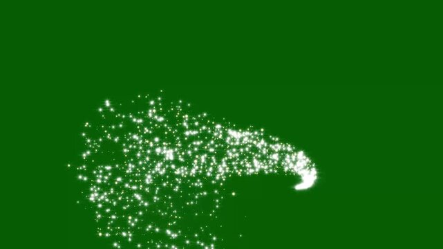 Golden glowing fairy dust with sparkling glitter stars, magical twinkle particles, luminous light sparks and luxury shimmer trails creating an elegant curved transition on green background. 4k video