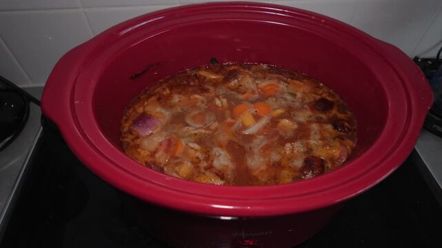 Panning shot of a slow cooker 4K60