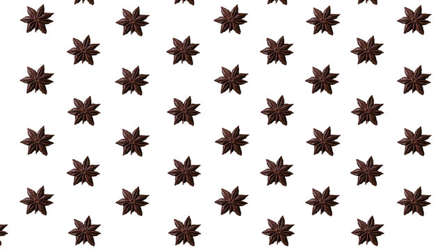 Isolated star anise spice pods arranged in a decorative pattern, aromatic culinary ingredient