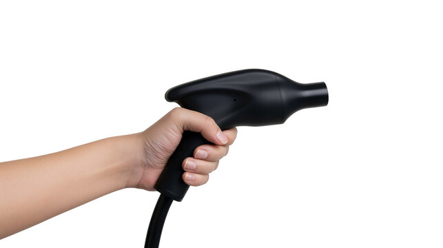 Isolated hand holding modern black electric vehicle charging plug for sustainable transport