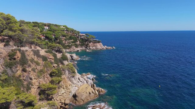Aerial view of Costa Brava, Spain, taken with a drone - the sea and coastal cliffs on a sunny day