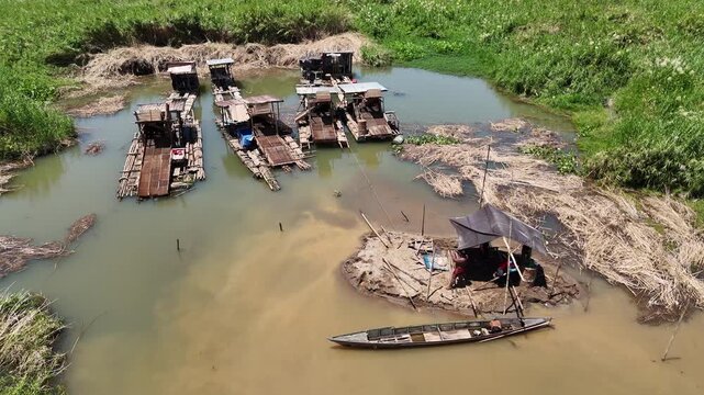 Gold mining boats in rural South Kalimantan, Indonesia
