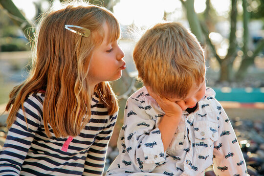Sister Showing Affection Towards Little Brother