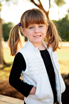 Portrait of Little Girl in Autumn