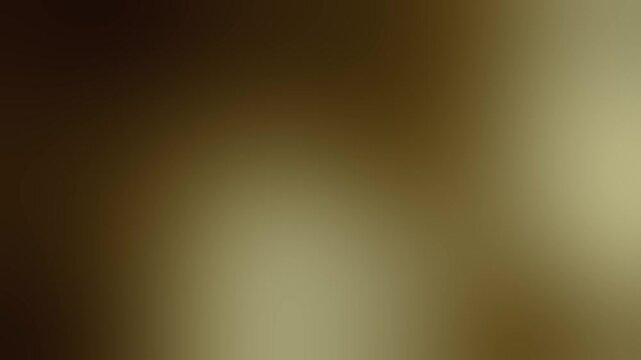 Warm golden amber light leak glowing softly with smooth organic movement on dark background, seamless loop