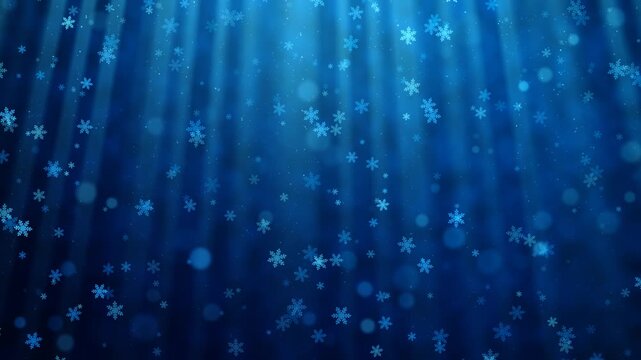 Shimmering blue snowflakes slwoly and gently descend through radiant light rays, magical winter background ideal for holiday themes
