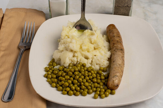 mashed potatoes with chicken sausage and peas