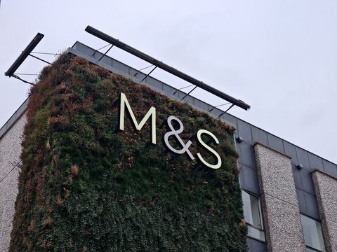 Newcastle upon Tyne,United Kingdom-11 February 2025:MARKS AND SPENCER store with living wall, sign closeup
