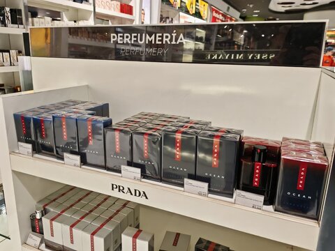 Lanzarote Airport,Spain-12 February 2025:Prada fragrances arranged on a duty free display shelf