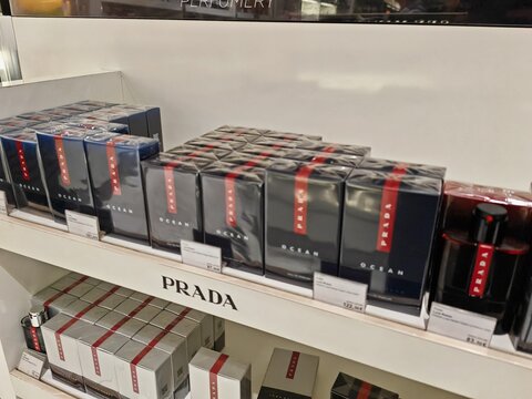Lanzarote Airport,Spain-12 February 2025:Prada fragrances arranged on a duty free display shelf