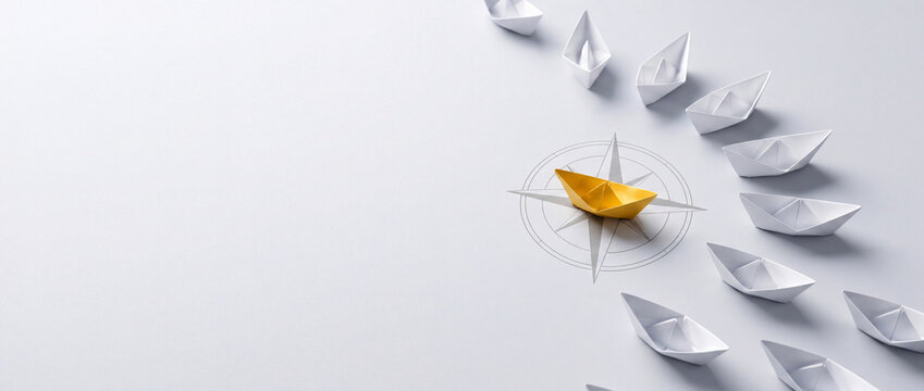 Yellow paper boat on a compass symbol leading white ships, representing leadership, business strategy, and navigating success in a minimalist style.