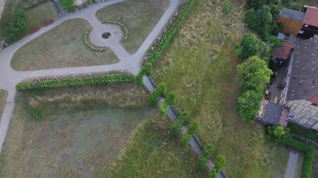 Overhead aerial of the geometric baroque garden hedges and paths