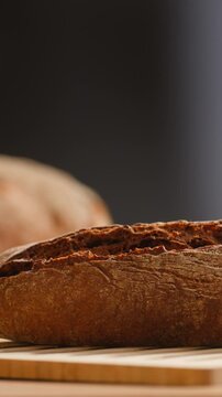 Bread assortment, mixed Spanish baguette loaves from Barcelona bakery, close-up macro shot showing crumb texture