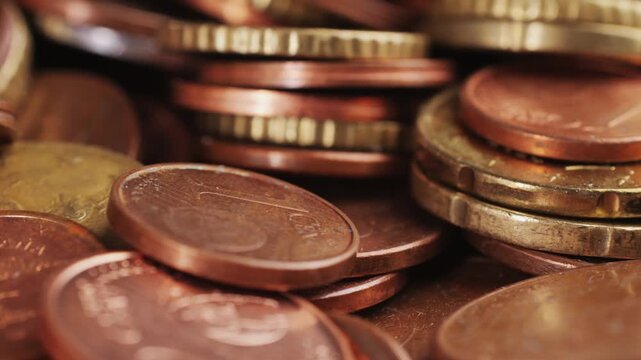 Coins background, euro coins. cent coins, counting euro cents