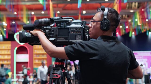 Professional cameraman broadcasting live event production