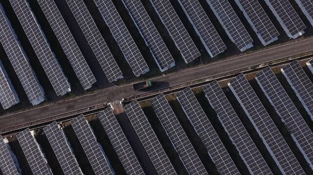Drone Flight Over a Photovoltaic Solar Farm.