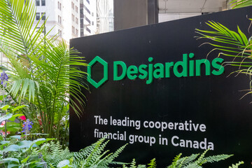 Obraz premium Toronto, Canada - September 7, 2026: Desjardins sign displayed outside their office building on King street in downtown Toronto. The Desjardins Group is a Canadian financial service cooperative and th