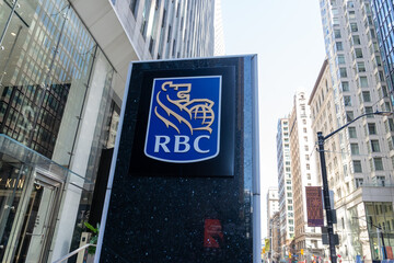 Obraz premium Toronto, Ontario, Canada - September 7, 2026: Closeup RBC (Royal Bank of Canada) logo sign outside the office building on King street in Toronto, Ontario, Canada. 
