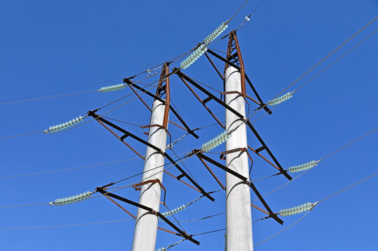 Two steel reinforced concrete power pole