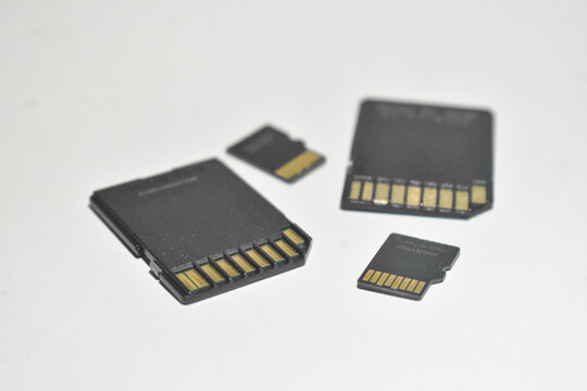 Close up of memory cards and micro SD cards isolated on white background