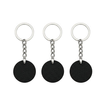 Three black circular metal keychains with silver rings for holding house keys isolated on transparent background