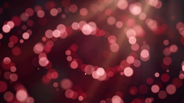 Dreamy wine red and rose blurred circles swirl through shallow depth with cinematic light rays, creating a luxurious atmospheric abstract background with smooth seamless motion.