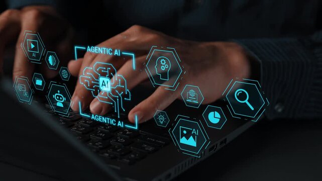 Hands typing on a laptop keyboard with futuristic holographic artificial intelligence icons and data elements illustrating innovation and technology concepts Gluon.