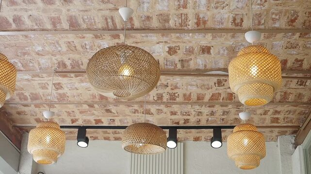 Cafe light fixtures on brick ceiling