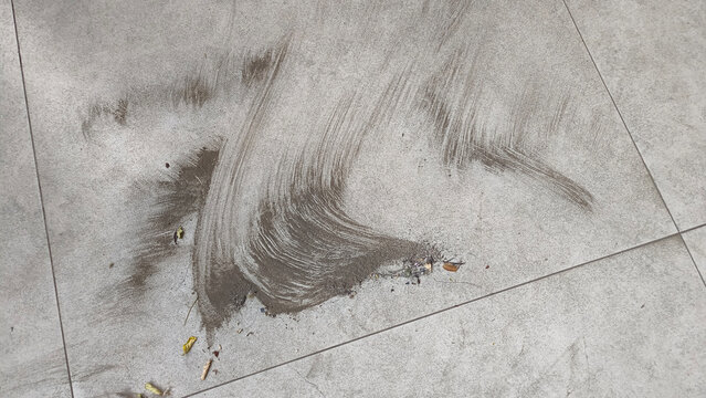 Sweeping up volcanic ash produced by the eruption of Anak Krakatau. The ash drifted hundreds of kilometers across the island of Java.