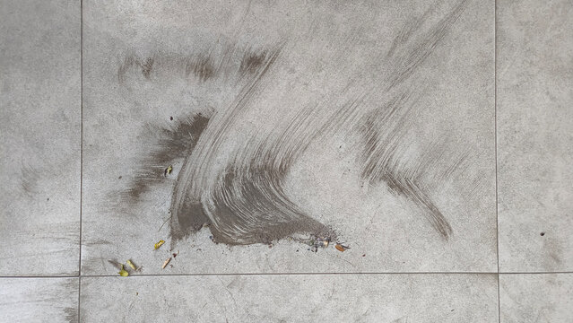 Sweeping up volcanic ash produced by the eruption of Anak Krakatau. The ash drifted hundreds of kilometers across the island of Java.