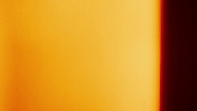 Retro 35mm Film Burn Transition with Vivid Edge Flare, Chromatic Exposure, Warm Halation, and Projection Artifacts