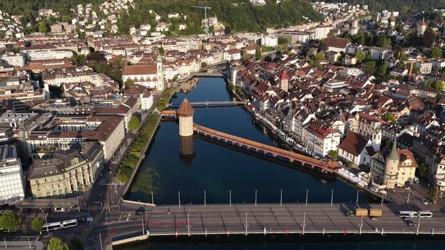 Chapel Bridge and the octagonal Water Tower in Lucerne, Switzerland aerial drone