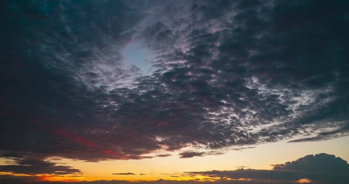 4k Aerial time lapse of Cloud with sunset sky background in Thailand,Cloudscape time lapse background Dark red purple sunset sky Nature background	
